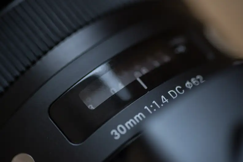 The focus scale is a nice touch, particularly given the new 30mm f/1.4's improved focusing capabilities.