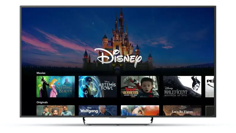 Smart television features Disney+ application on screen.