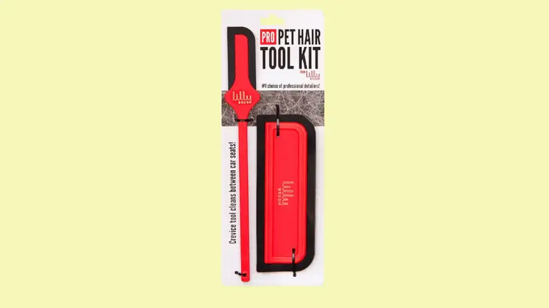 Red pet brush package against yellow background