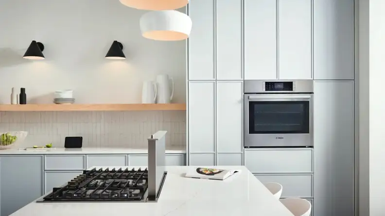 Bosch HBL8454UC oven in modern kitchen setting.