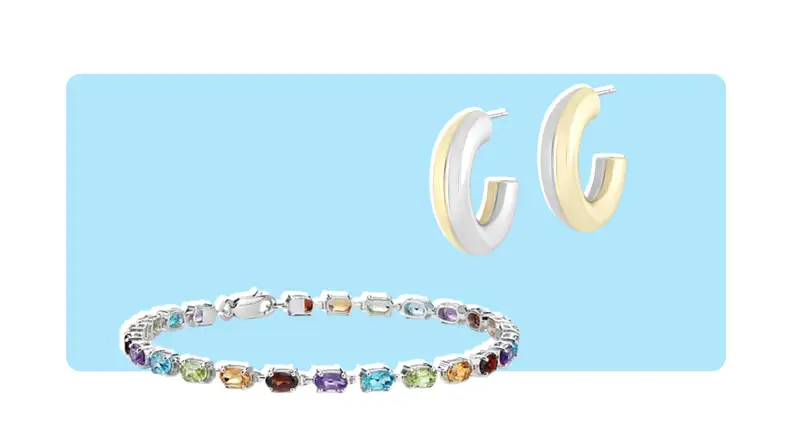 A multicolored gemstone bracelet, and hoop earrings that have both gold and silver details.