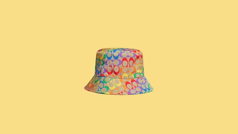 rainbow printed bucket hat on yellow background