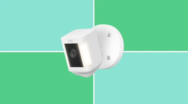 The Ring Spotlight Cam on a green and blue background.
