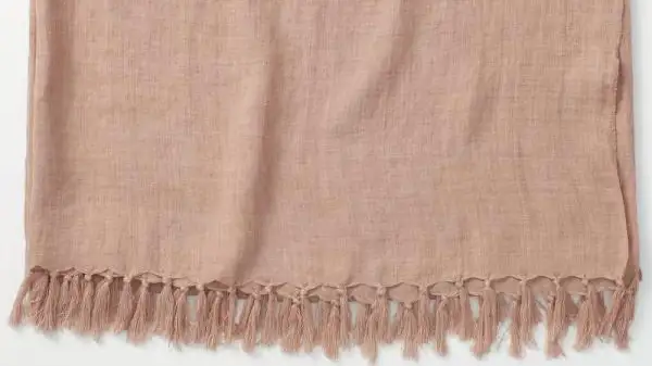 The Company Store's blush linen throw blanked