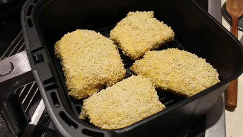 A serving of crinkle French fries in the Cosori TurboBlaze basket.