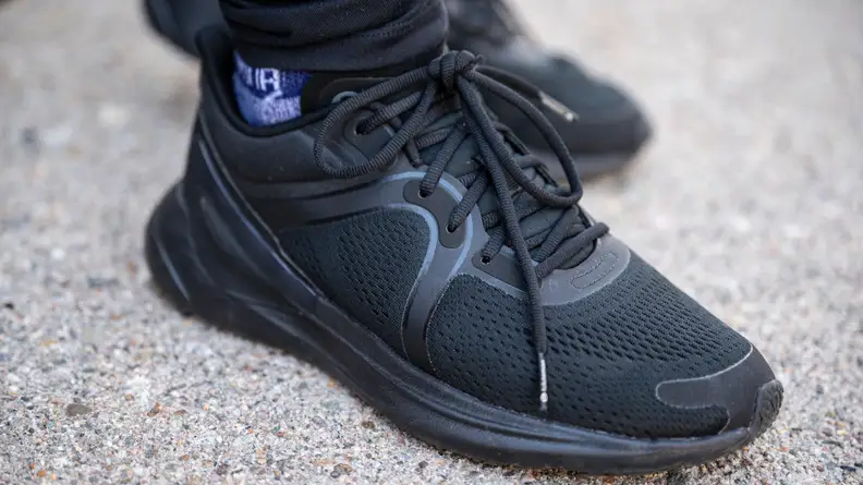 A close-up of the Lululemon blissfeel running shoe in black