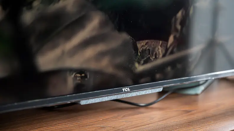 A close-up of the TCL logo on the front of the 5-Series' panel