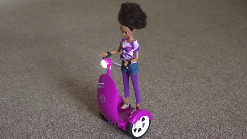 Each Smart Buddies kit comes with a scooter (or "siggy") and a doll  version of one of the eight teenagers who are the stars of the Smart Buddies app.