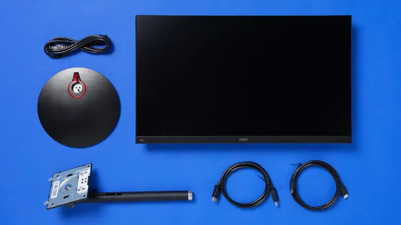 The contents of the Acer Nitro XV272U Vbmiiprx, including AC cord and HDMI cables.