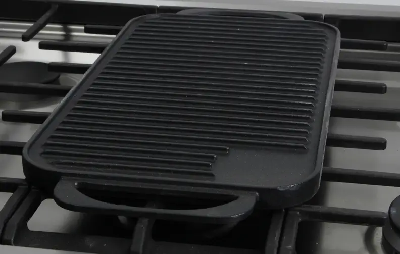 The included griddle attachment.