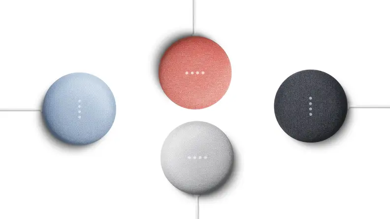 Four multicolored Google Nest Minis.