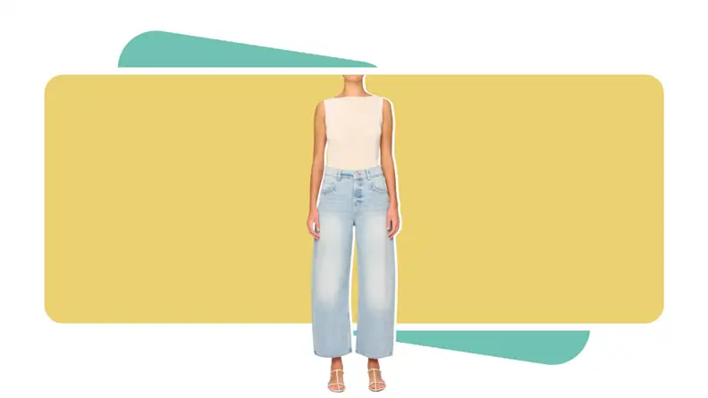 A model wearing faded jeans.