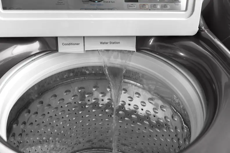 This GE top-load washer has a "faucet" inside