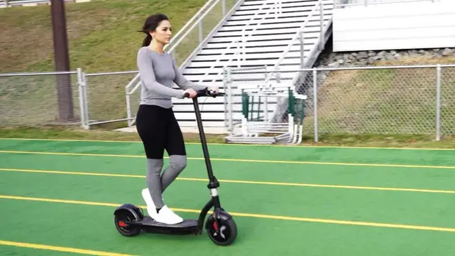 Woman on electric scooter