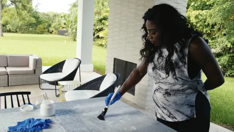 Serena Williams doing artwork, as seen in "Being Serena," one of the best documentaries to stream now.