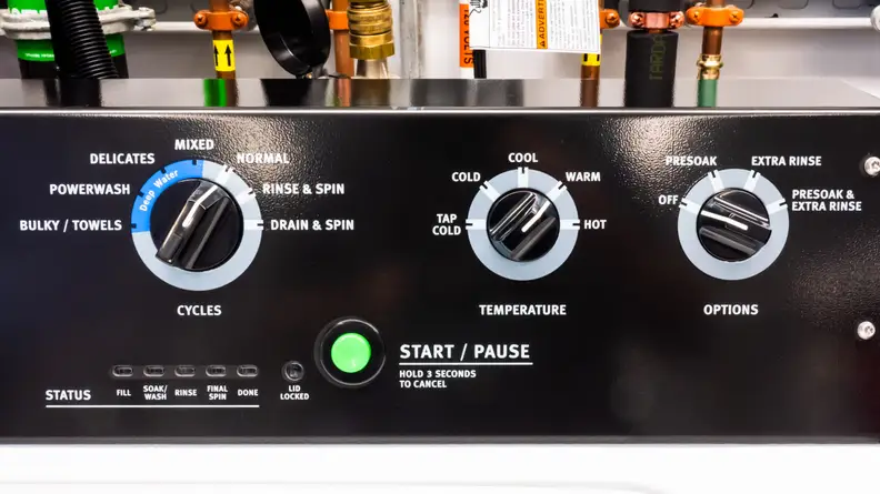 The control panel on top of the Maytag MVWP576KW Top-loading Washing Machine with Pole Agitator.