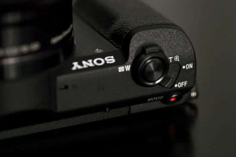 A shot of the shutter release and top controls on the A5100.