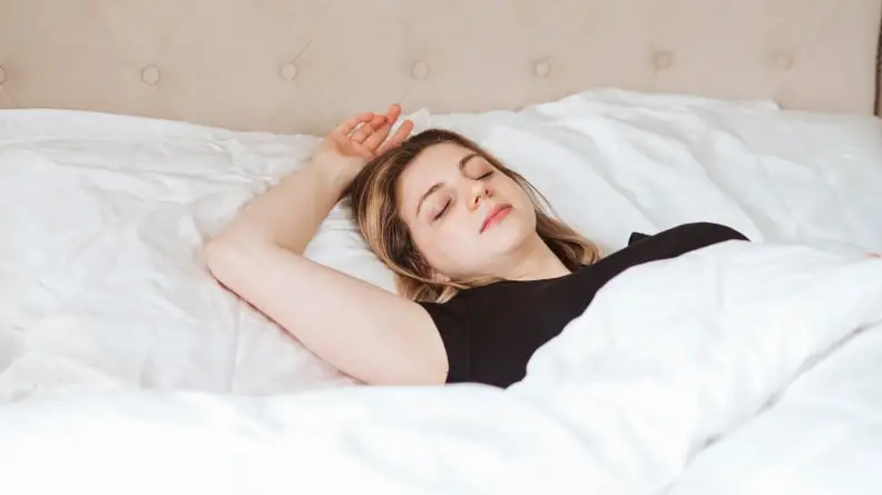 woman sleeping on silk pillowcases