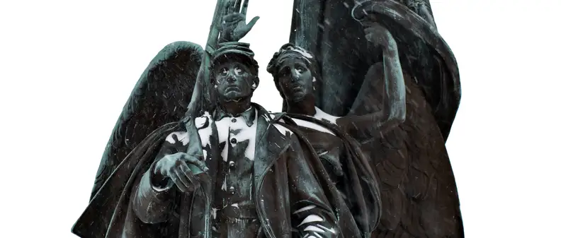 A photo of a statue taken during winter storm Juno.