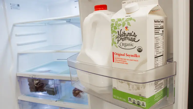 You can store gallon containers in the door