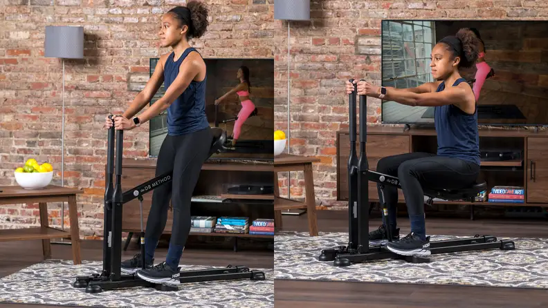 woman using db method squat machine