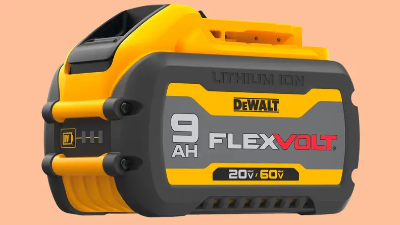 A close-up of the Dewalt DCB609 Flexvolt battery pack floating above a peach-colored background.