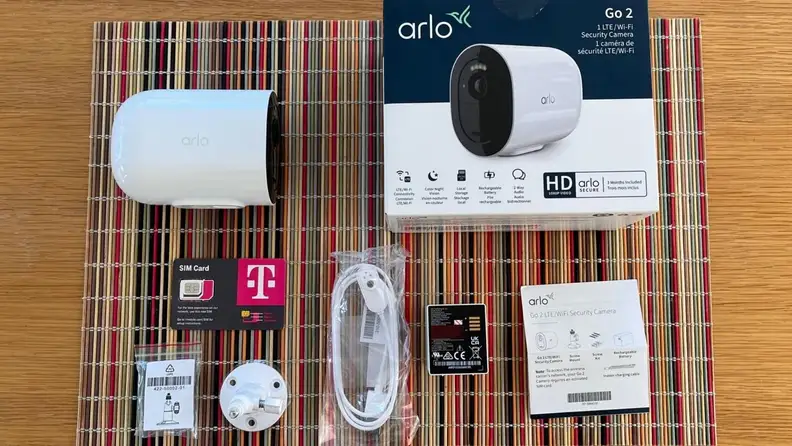 The retail box of the Arlo Go 2 with all of its contents outside the box.