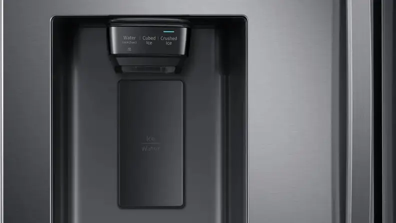 A close-up of the Samsung RF27T5201SG's ice and water dispenser