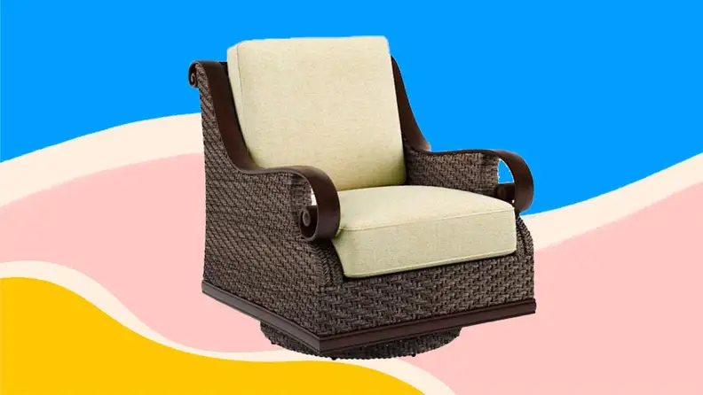 A beige outdoor lounge chair against a colorful background.
