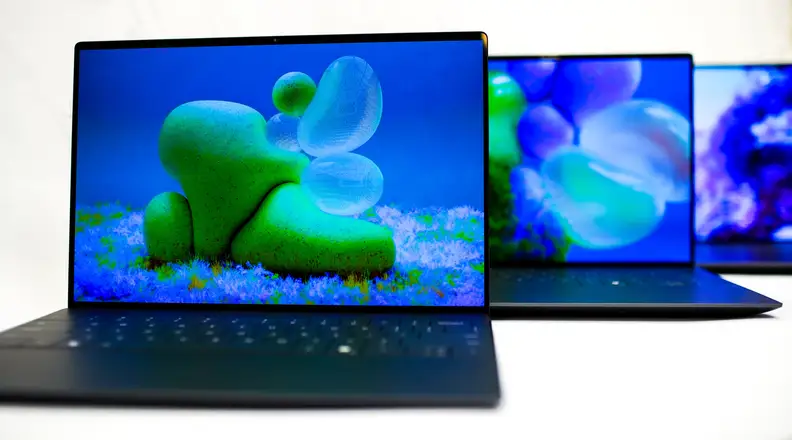 Three laptops in a staggered line