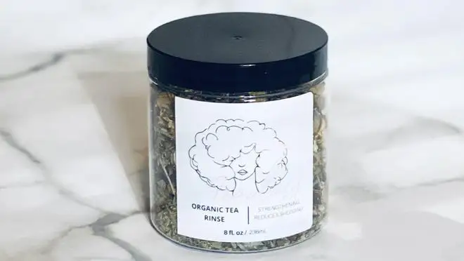 A jar of hair tea rinse.