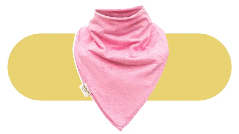 A pink KayCey bib on a colorful background.
