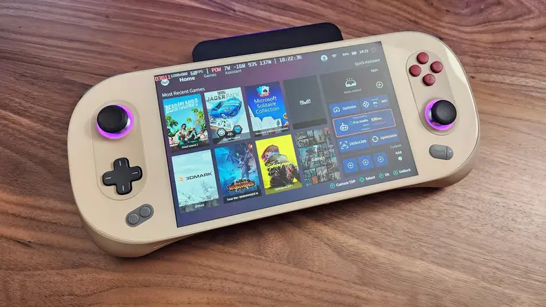 Ayaneo 2S Handheld Gaming PC on top of hardwood surface.
