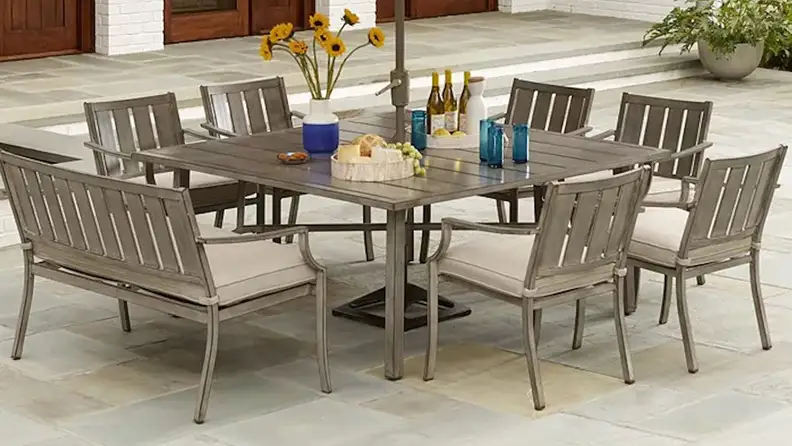 Tan patio furniture set outdoors.
