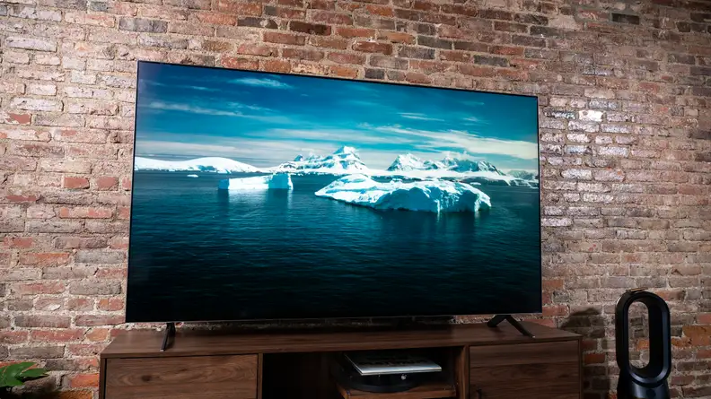 The LG QNED99 8K TV displaying 4K/HDR content in a living room setting