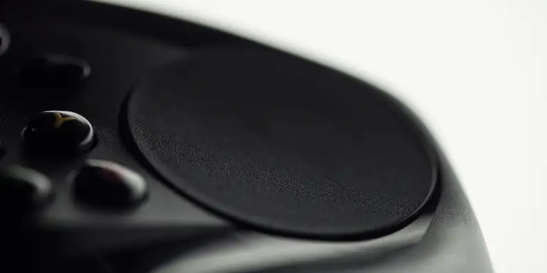 A close-up photo of the Valve Steam Controller's right touchpad.