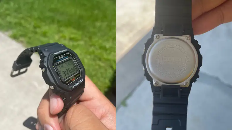 hand holding G-Shock DW5600E, back case of G-Shock DW5600E