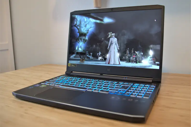 An Acer Predator Helios 300 gaming laptop on a desk.