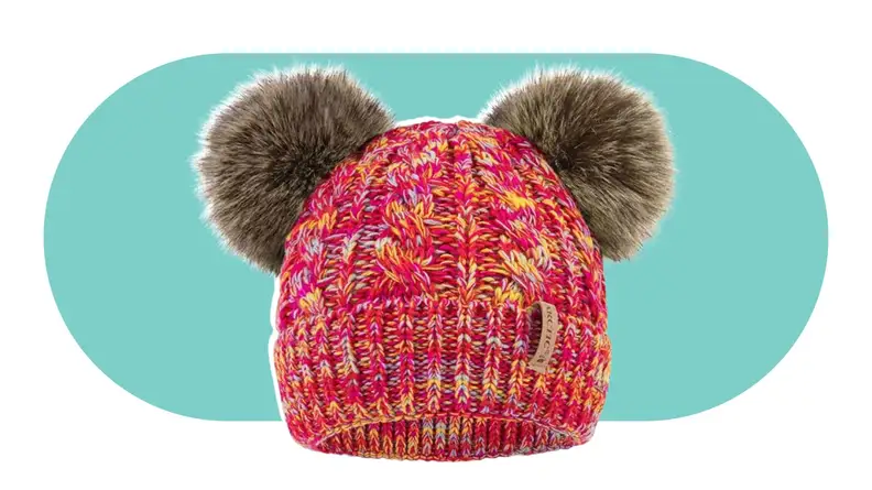 A red knit hat with two faux fur pom-poms on top.