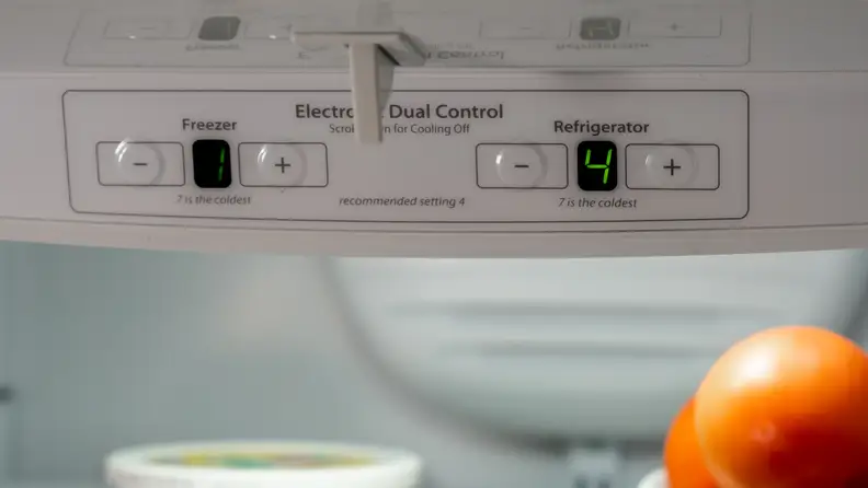 A close-up of a refrigerator's digital control panel.