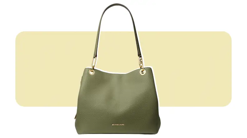 A large green leather bag with gold hardware.