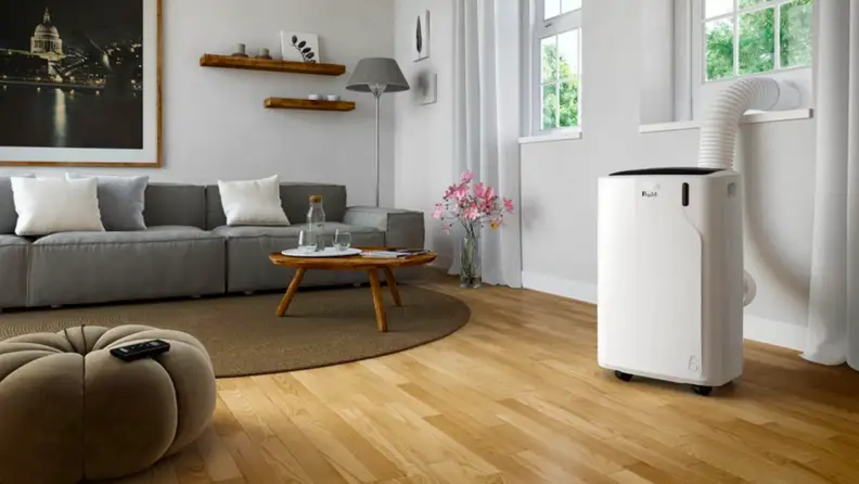 A standing AC unit sits in a living room.