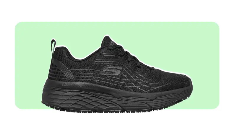 Black Max Cushioning Elite SR shoes on a colorful background