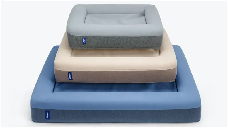 A small-, a medium-, and a large-sized dog bed stacked on top of each other