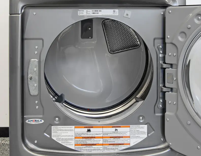 The Maytag Maxima MED8100DC's stainless interior has a 7.4-cubic-foot capacity.