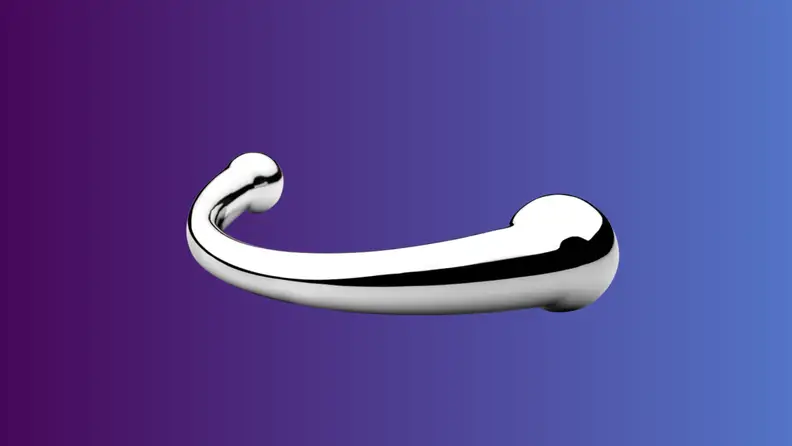 An anal sex toy sits on an indigo fade background