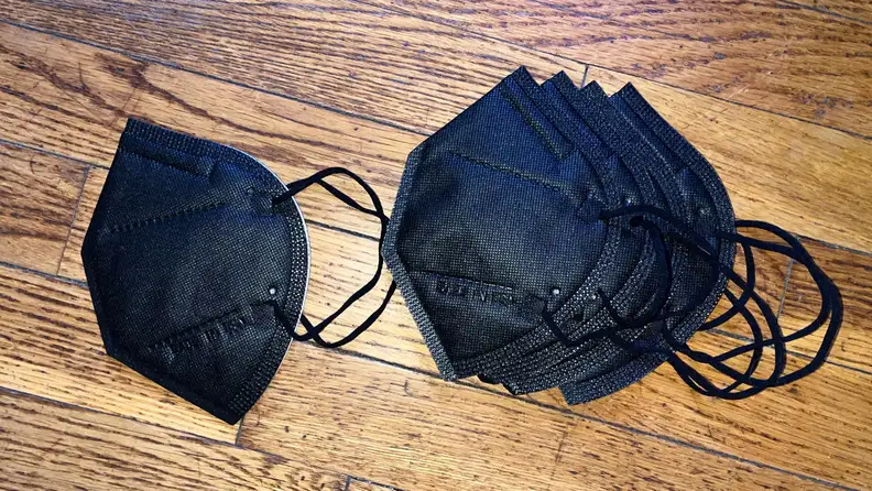 A pair of black Vida face masks.