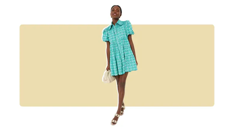 A green printed mini shirt dress with a Peter Pan collar.