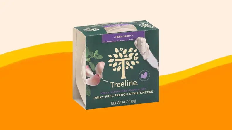 A product photo of Treeline cheese on an orange and beige background.