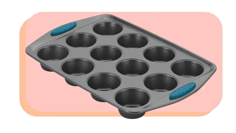 Muffin pan with blue handles on both sides.